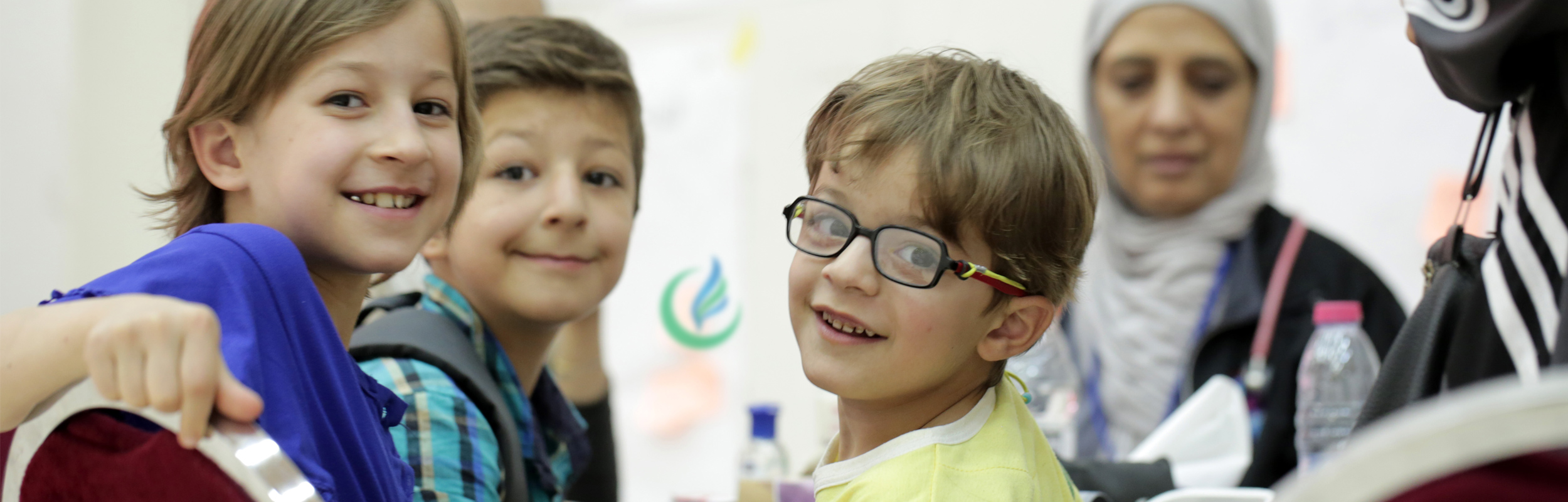 IMANA-Website-slider-Donation-page-2500x800-3 children smiling